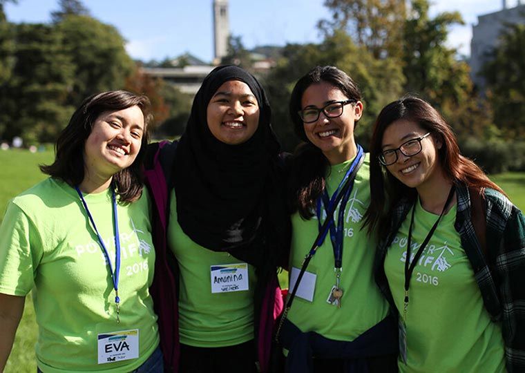 Four activists wearing Power Shift 2016 t-shirts